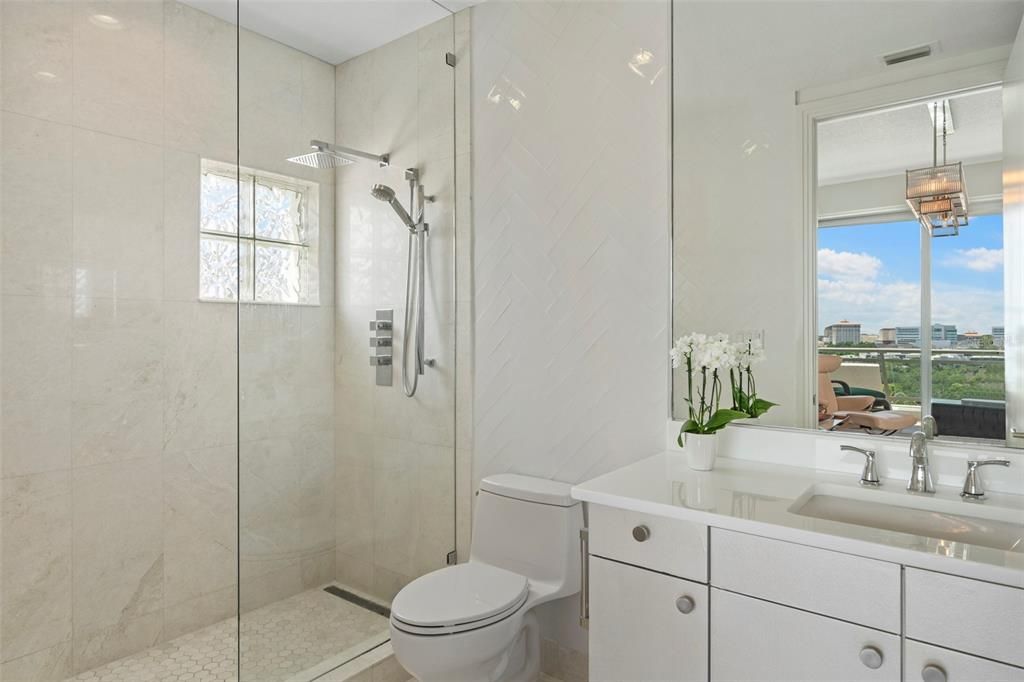 Second guest bedroom ensuite bath with fully updated amenities.