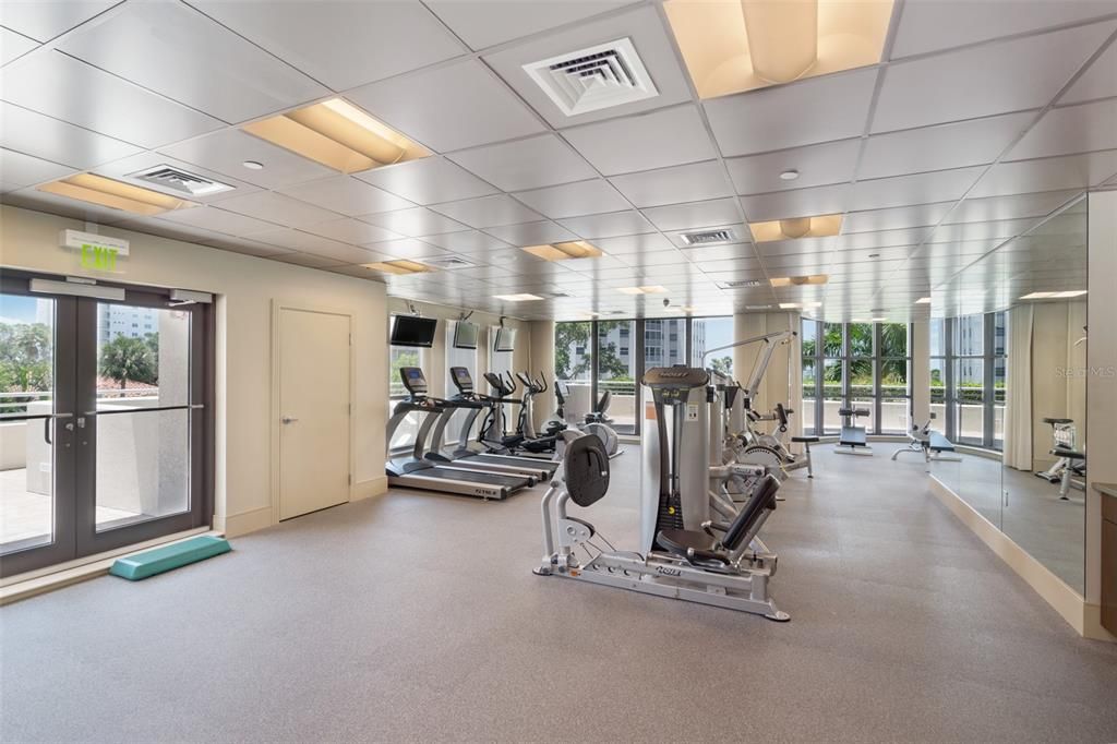 Savoy fitness center with massage room