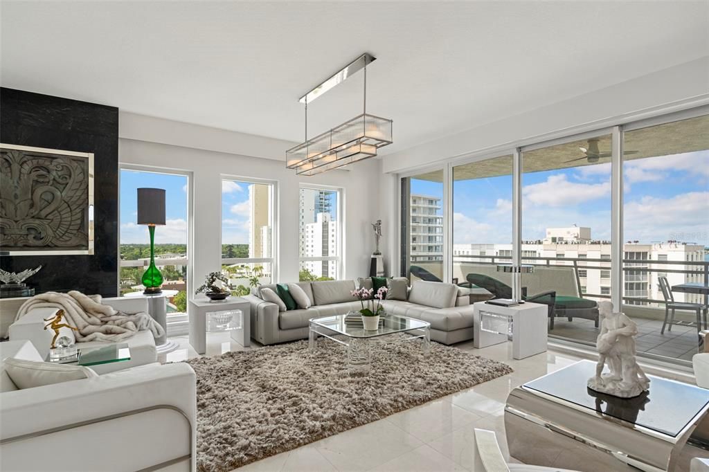 The living room boasts incredible views through the floor to ceiling impact sliding doors.