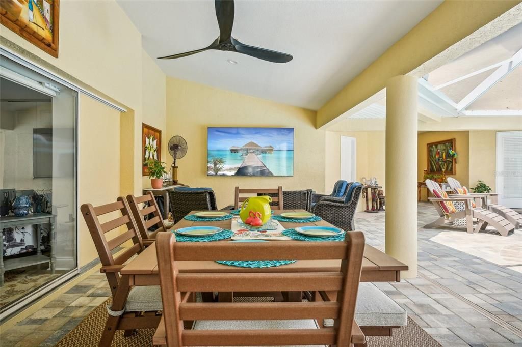 View of the 85" TV from the lanai sitting area.