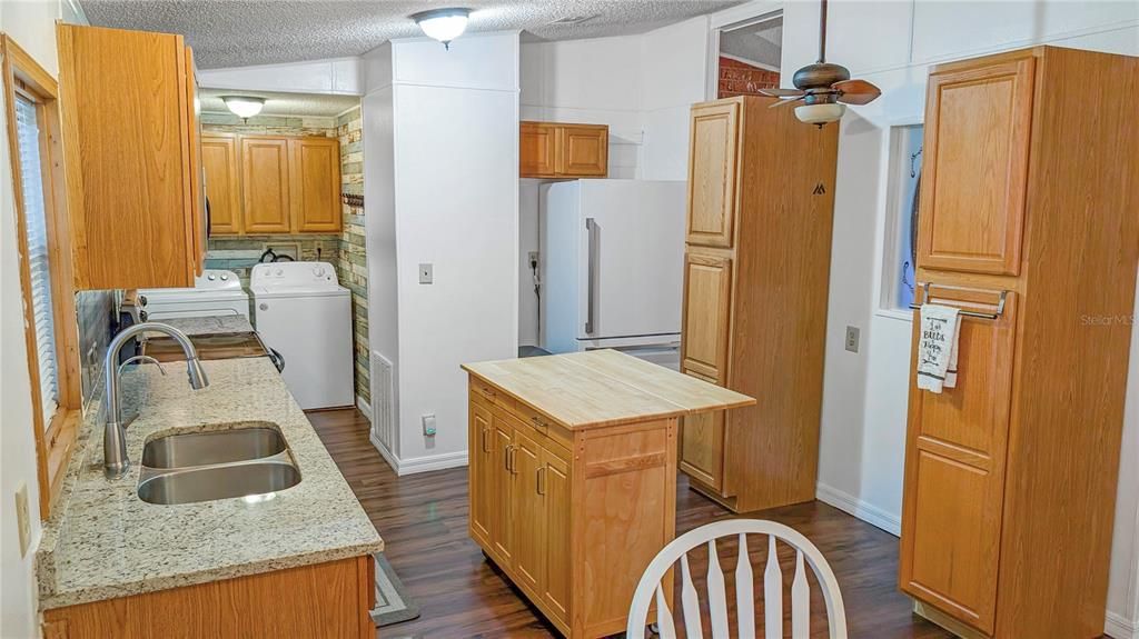 View of Kitchen and Laundry Room as seen from Dining room!