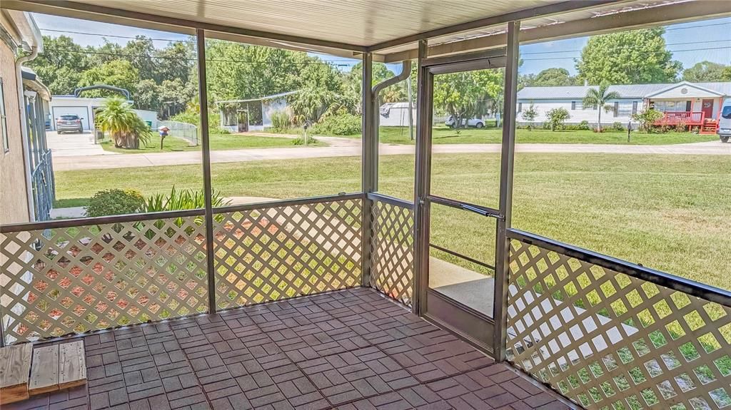 Gorgeous front porch! You enjoy Sunsets on your West-Facing SCREENED PORCH that overlooks a LARGE Corner lot with lots of Room to RUN!