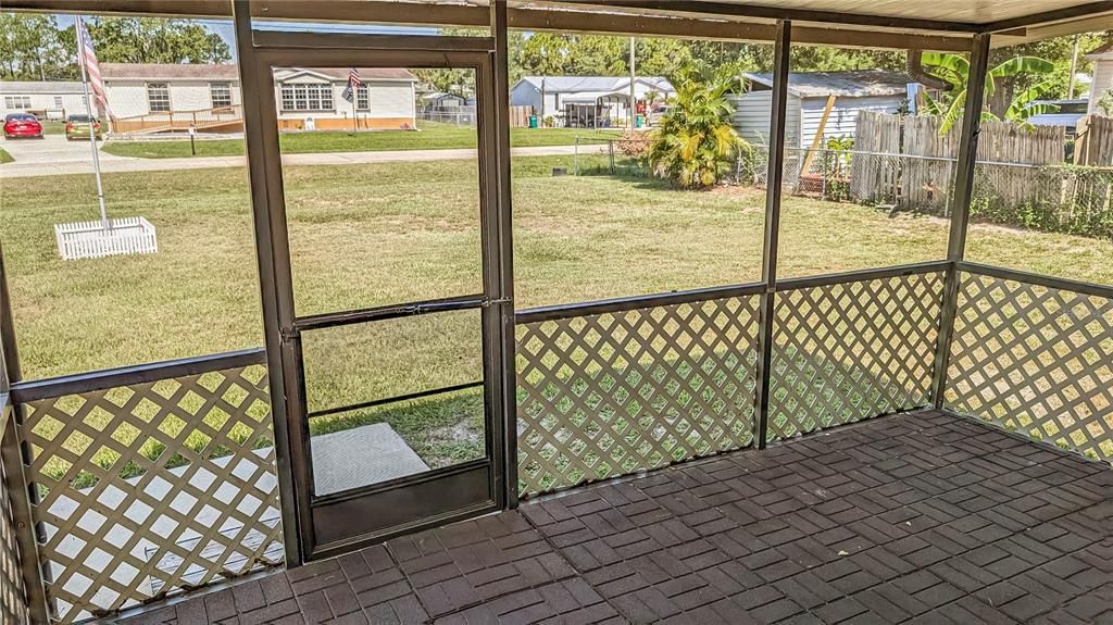 You enjoy Sunsets on your West-Facing SCREENED PORCH that overlooks a LARGE Corner lot with lots of Room to RUN!