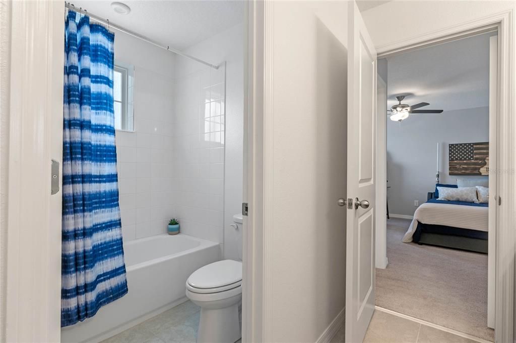 Separate Water Closet with Shower Upstairs in Second Bathroom