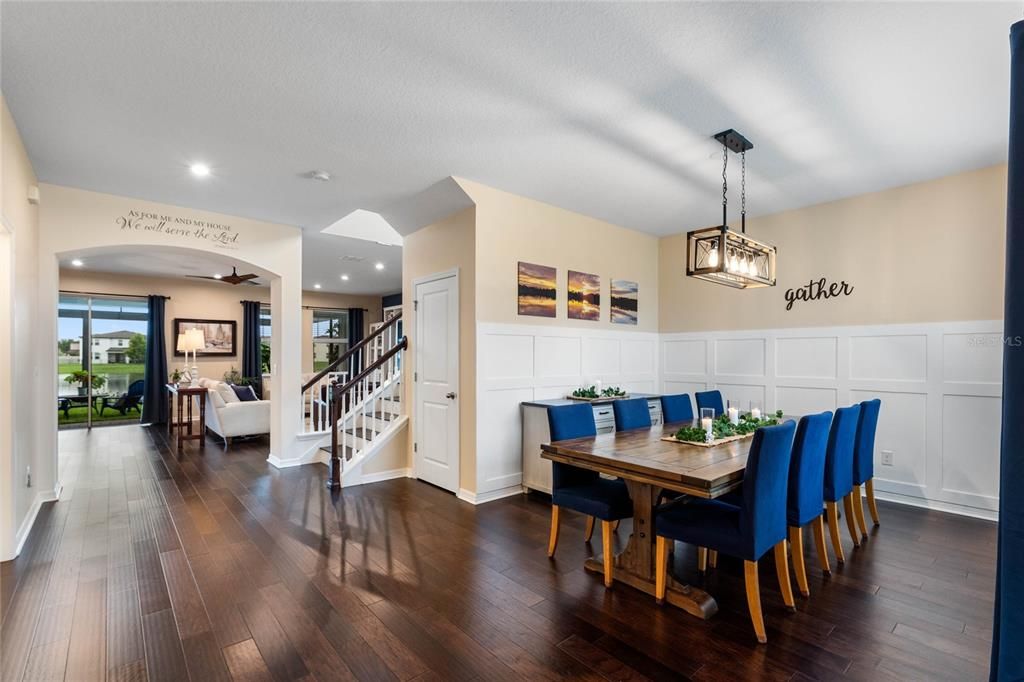 Entry Way with Formal Dining on Right with Beautiful Woodwork