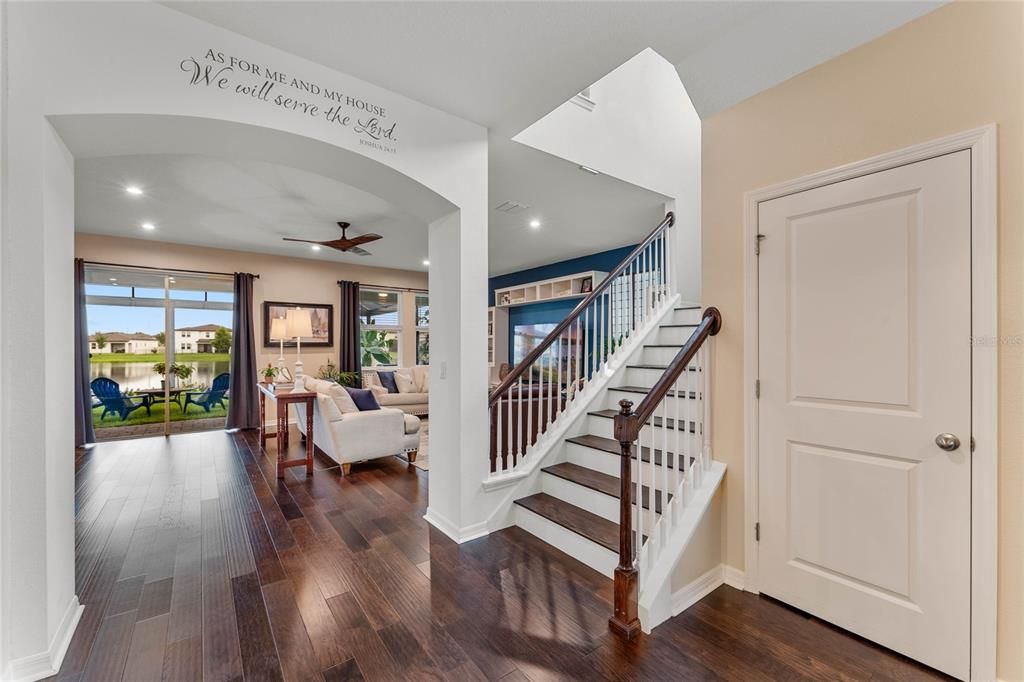 Nice Open Staircase with Gorgsou Hardwood Floors