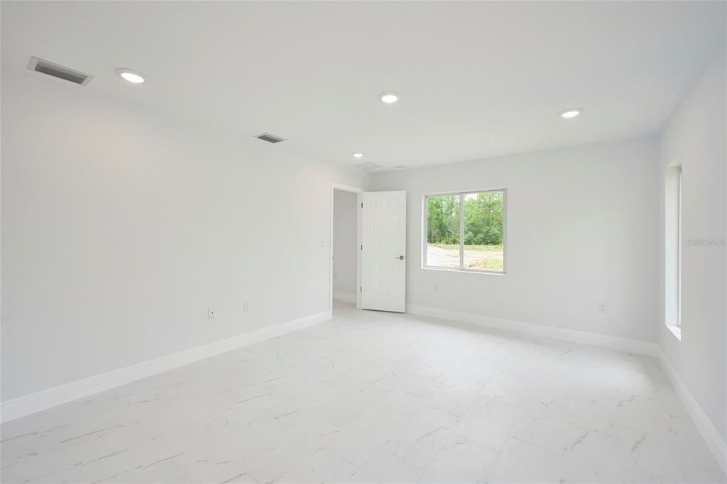 View of master bedroom suite looking back to room entrance.