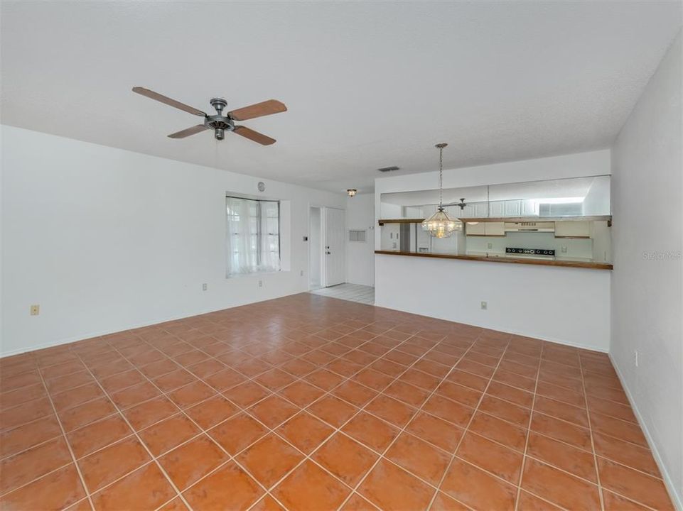 Living room, dining area, foyer, kitchen