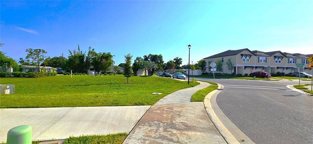 Non-gated community includes street light posts and sidewalks