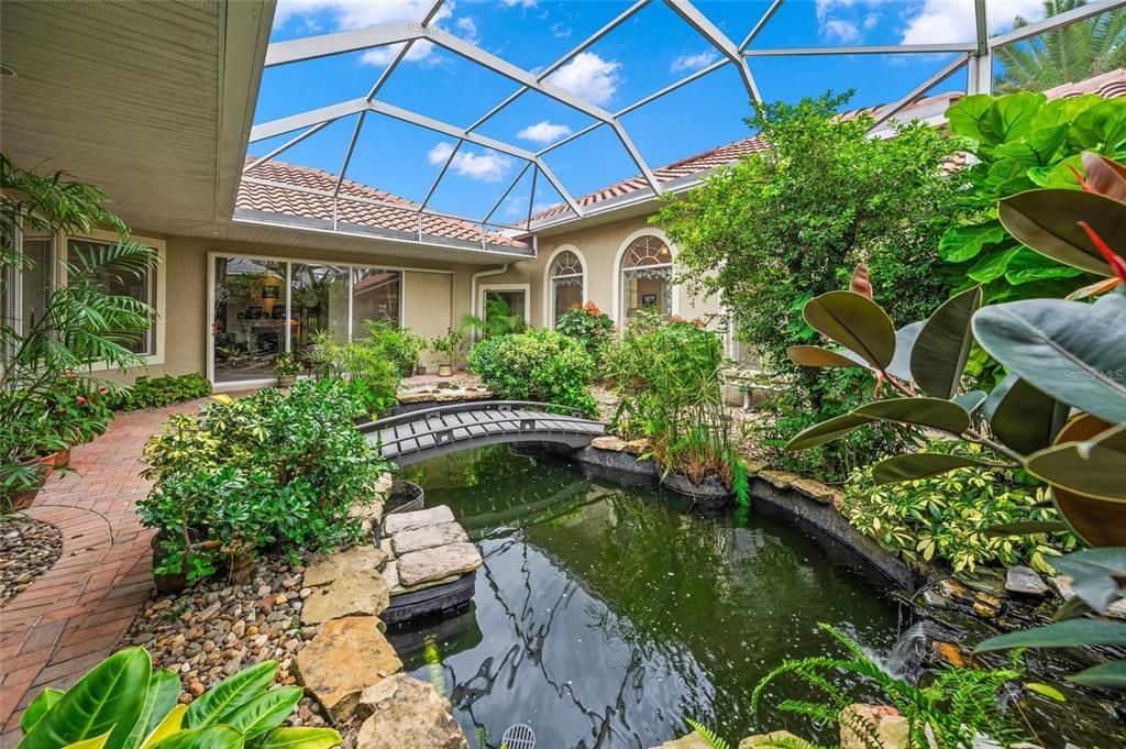 A uniquely perfect setting to relax and enjoy your koi pond among the lush greenery. Buyer can convert this space to another use.