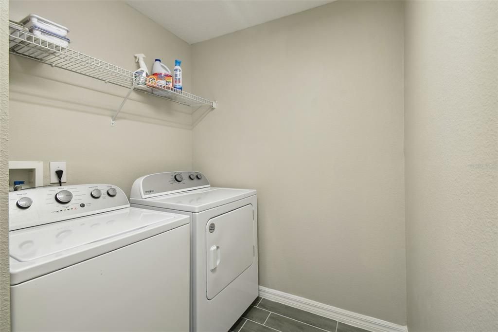Laundry Room located off Foyer.