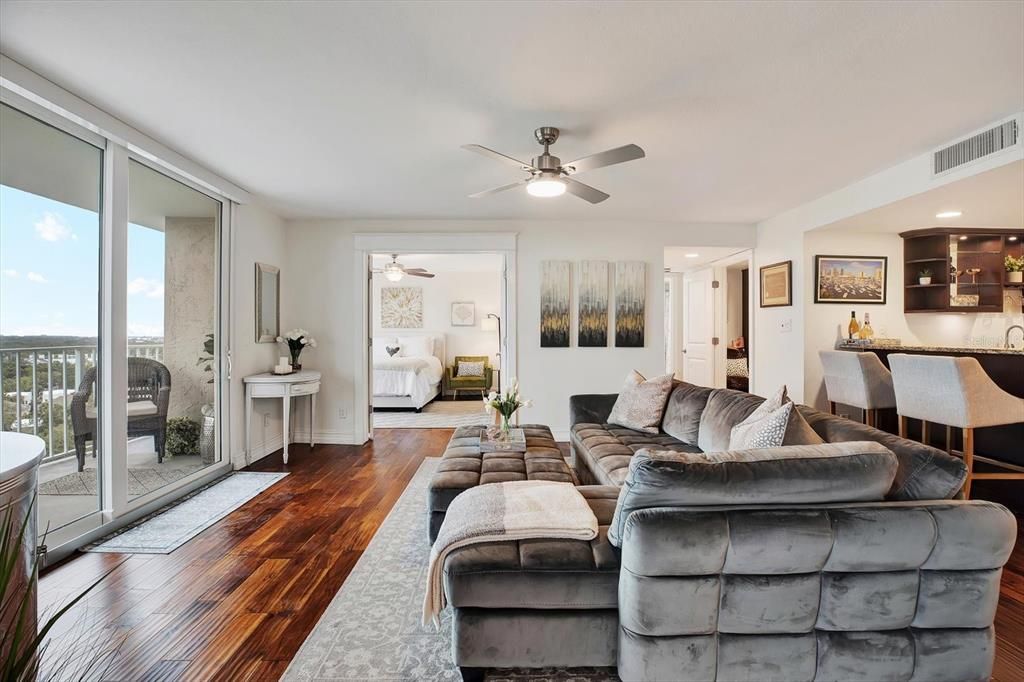 Second living room with wet bar and city views.