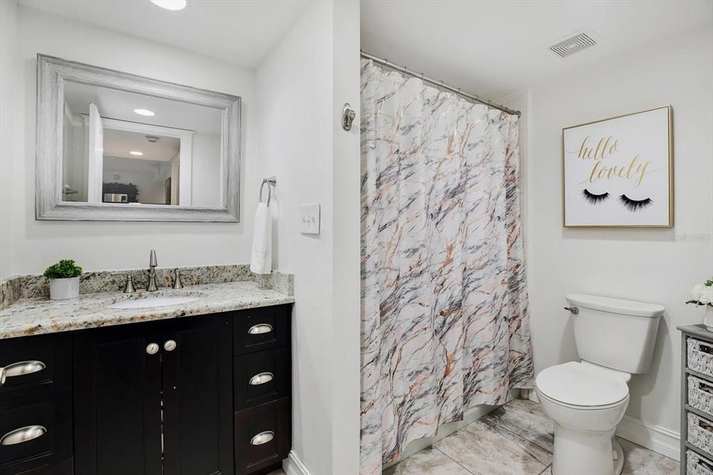 Third bathroom located near the third bedroom.