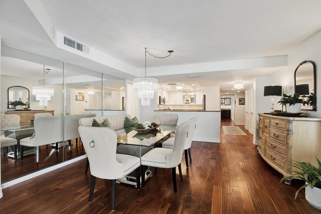 The dining room is open to the living room and kitchen.