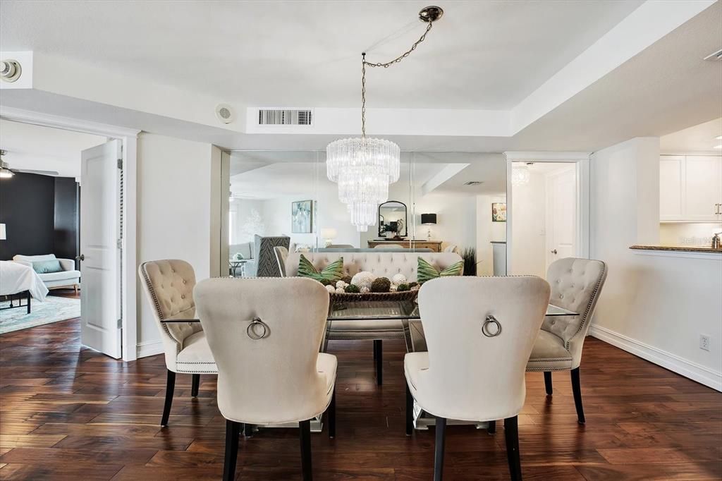 The dining room is open to the living room and kitchen.