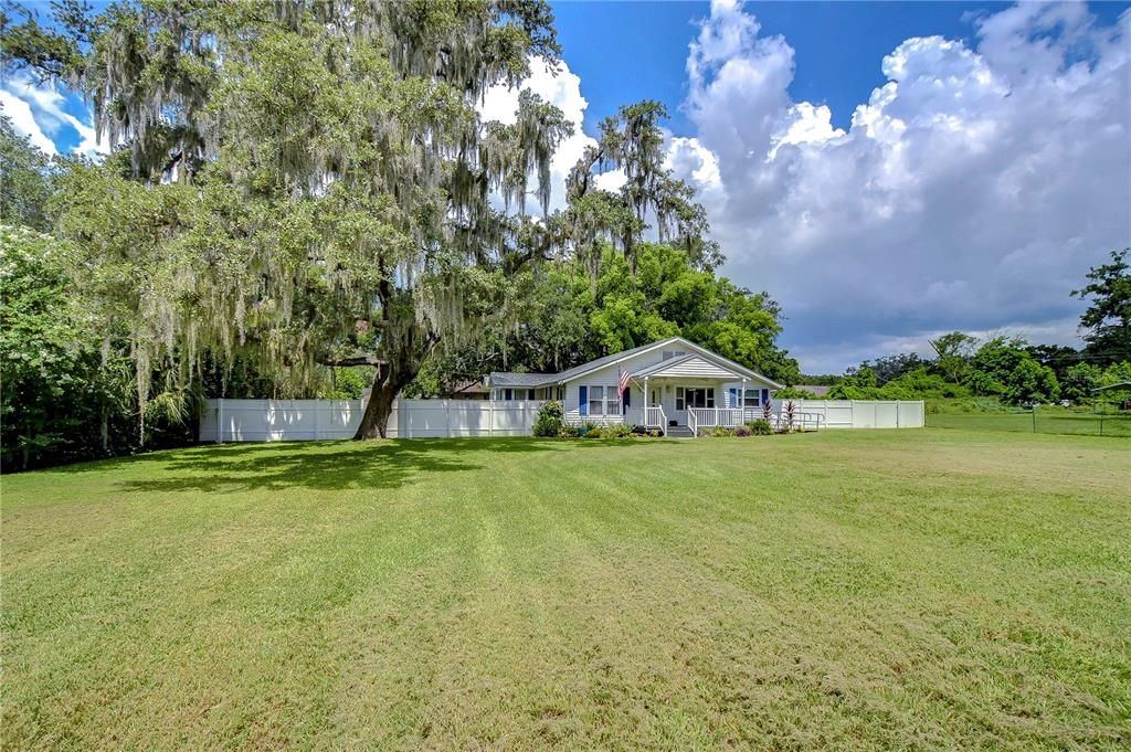 Adorned with majestic grandfather oaks that provide dappled shade and a serene ambiance!