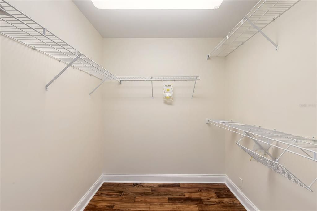 walk in closet in primary bedroom.