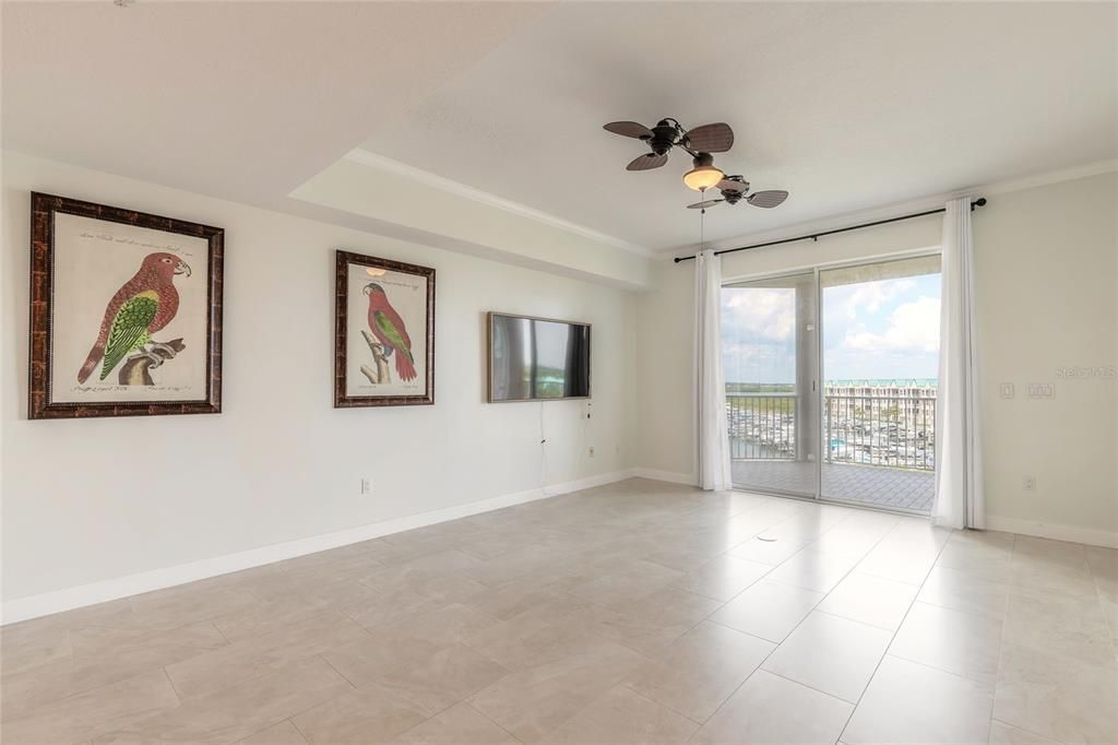 living room with sliders to private balcony