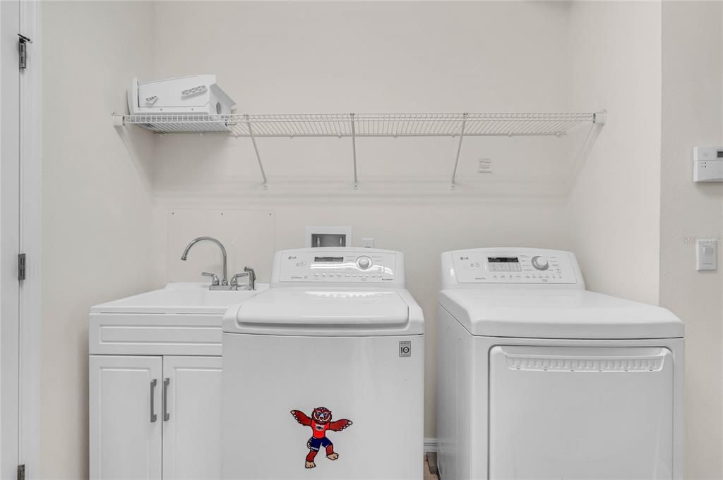 Laundry room with utility sink