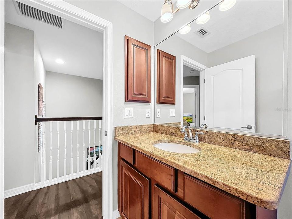 All bedrooms are spacious with new flooring.