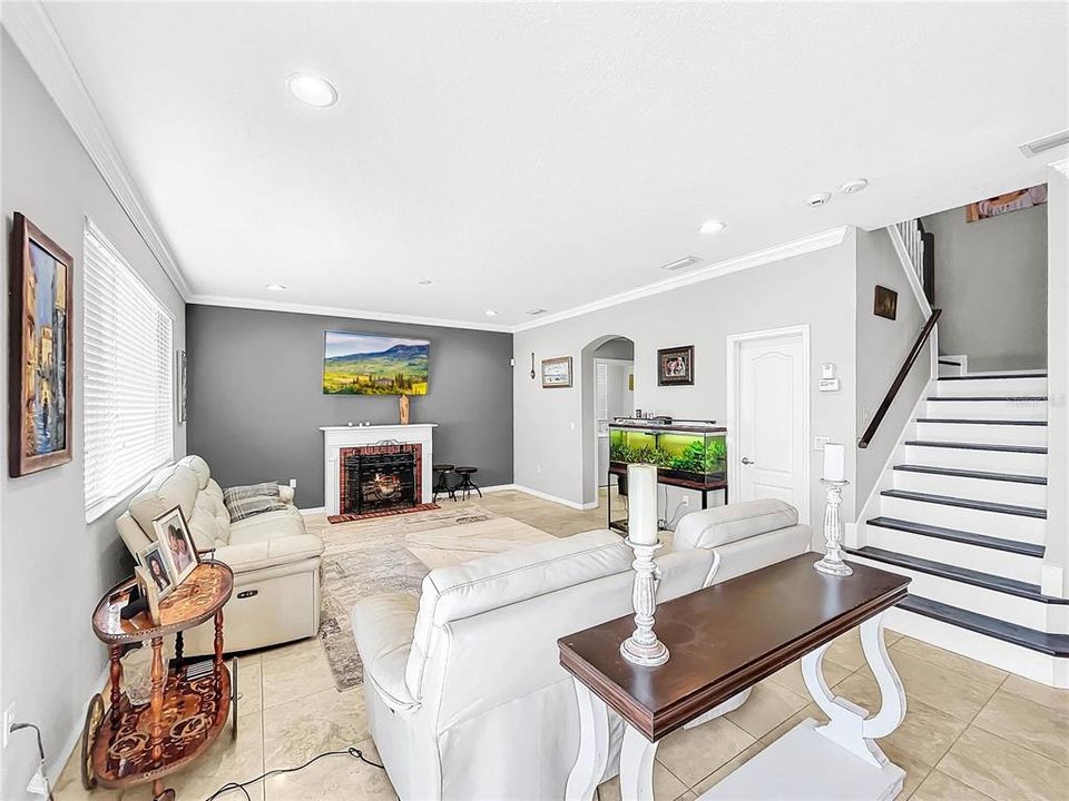 The large family room the view of the golf course and is open to the kitchen.