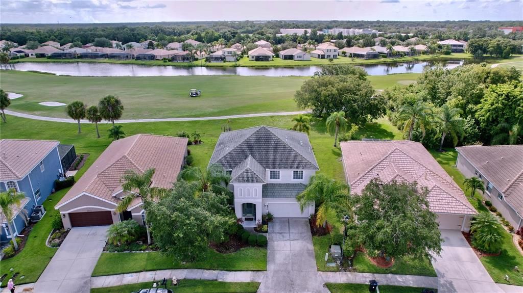 Beautiful view of the golf course and lake from the back.