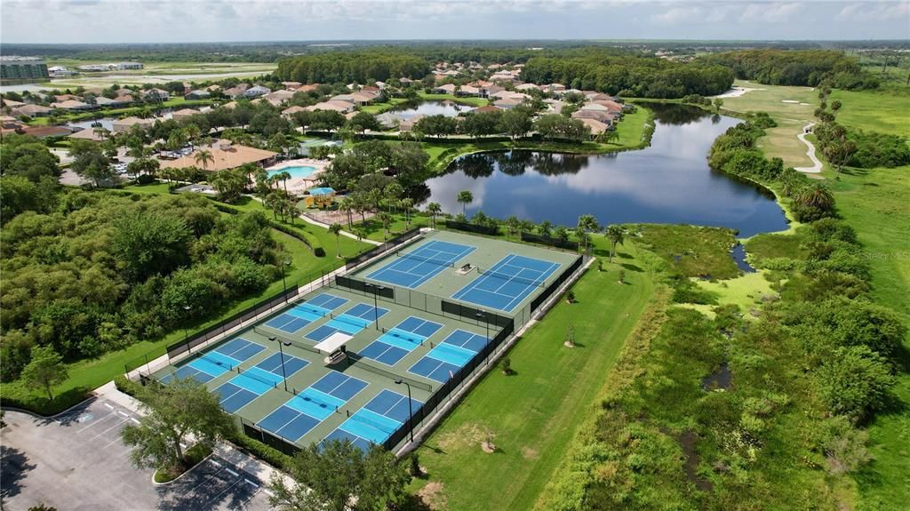 Two community pools one is Olympic size with an additional children's pool area and playground.  Other amenities include; fitness center, Clubhouse, Dog Park, Fitness Center, Playground,  Restaurant, Tennis Courts, corn hole, volleyball,shuffleboard and more.