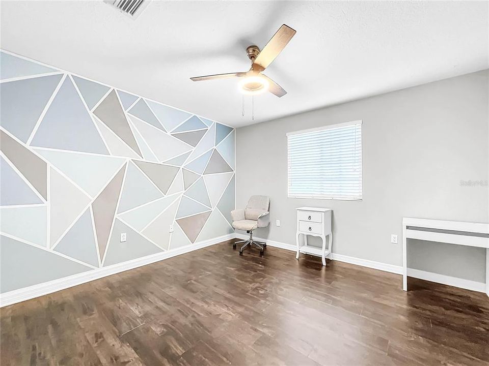 All bedrooms are spacious with new flooring.