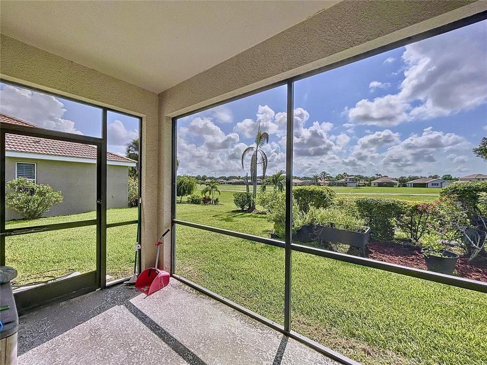 The large family room the view of the golf course and is open to the kitchen.