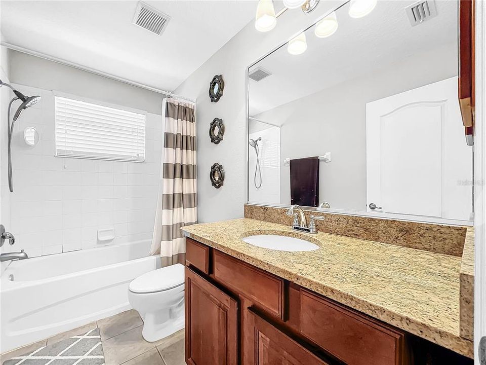 3.5 bathrooms with granite countertops.  Convenient to all family room and all bedrooms.