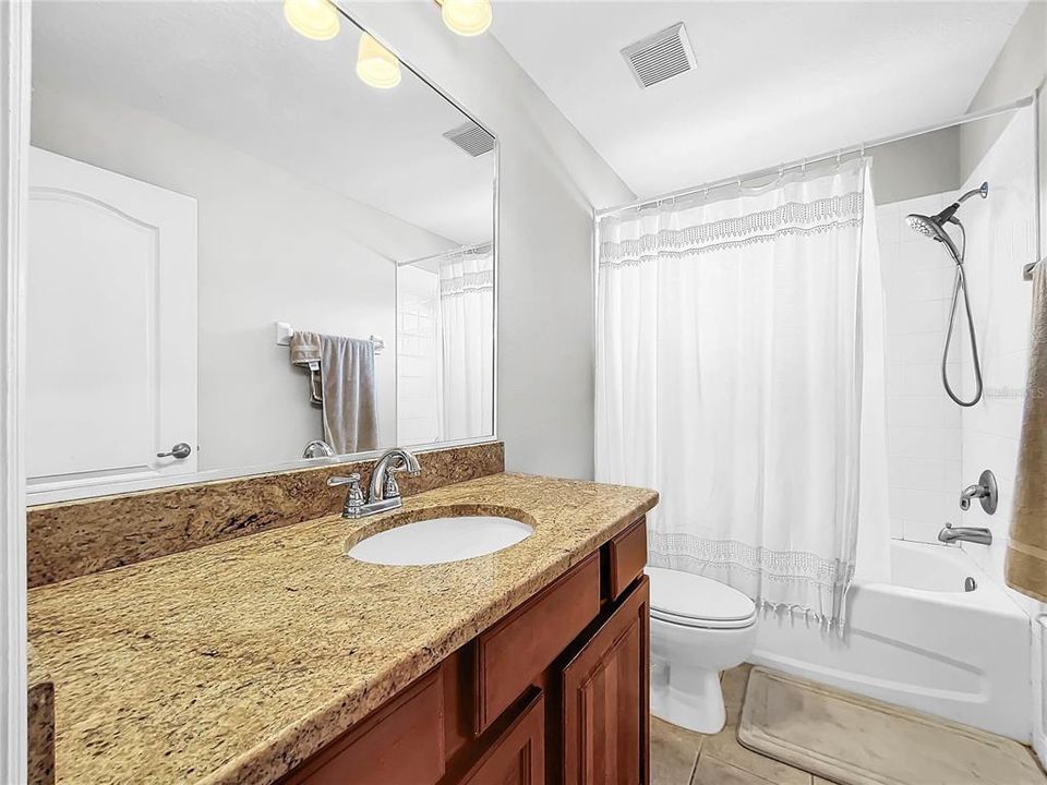 3.5 bathrooms with granite countertops.  Convenient to all family room and all bedrooms.