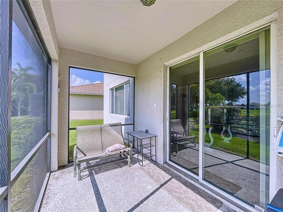 The large back porch and screened. It has a beautiful golf course view.