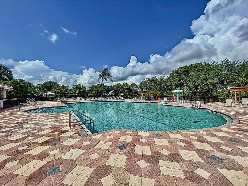 Two community pools one is Olympic size with an additional children's pool area and playground.  Other amenities include; fitness center, Clubhouse, Dog Park, Fitness Center, Playground,  Restaurant, Tennis Courts, corn hole, volleyball,shuffleboard and more.