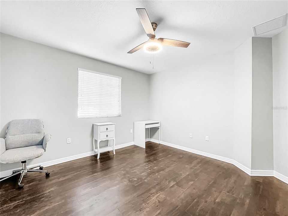 All bedrooms are spacious with new flooring.