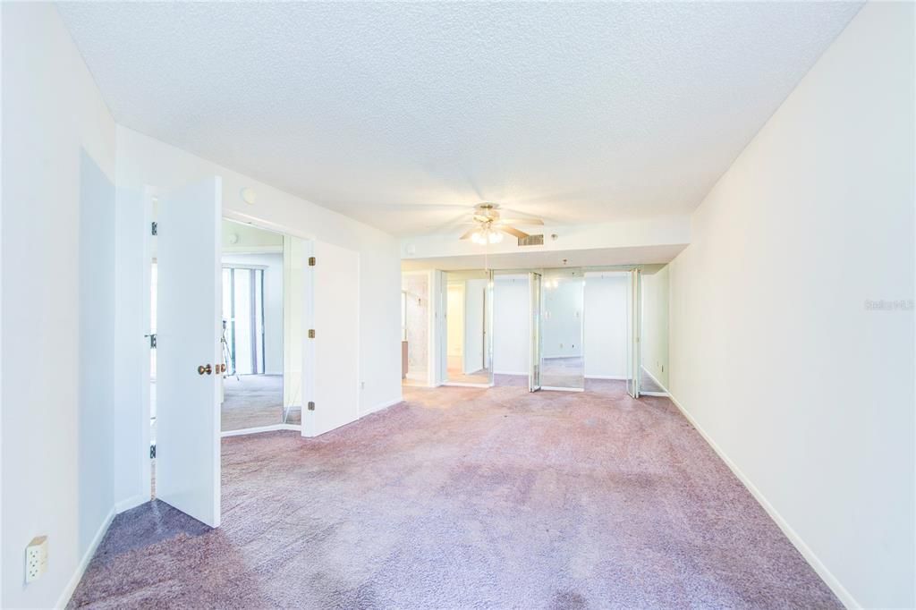 Spacious Owners Suite boasts 2 WALK IN CLOSETS and French doors.