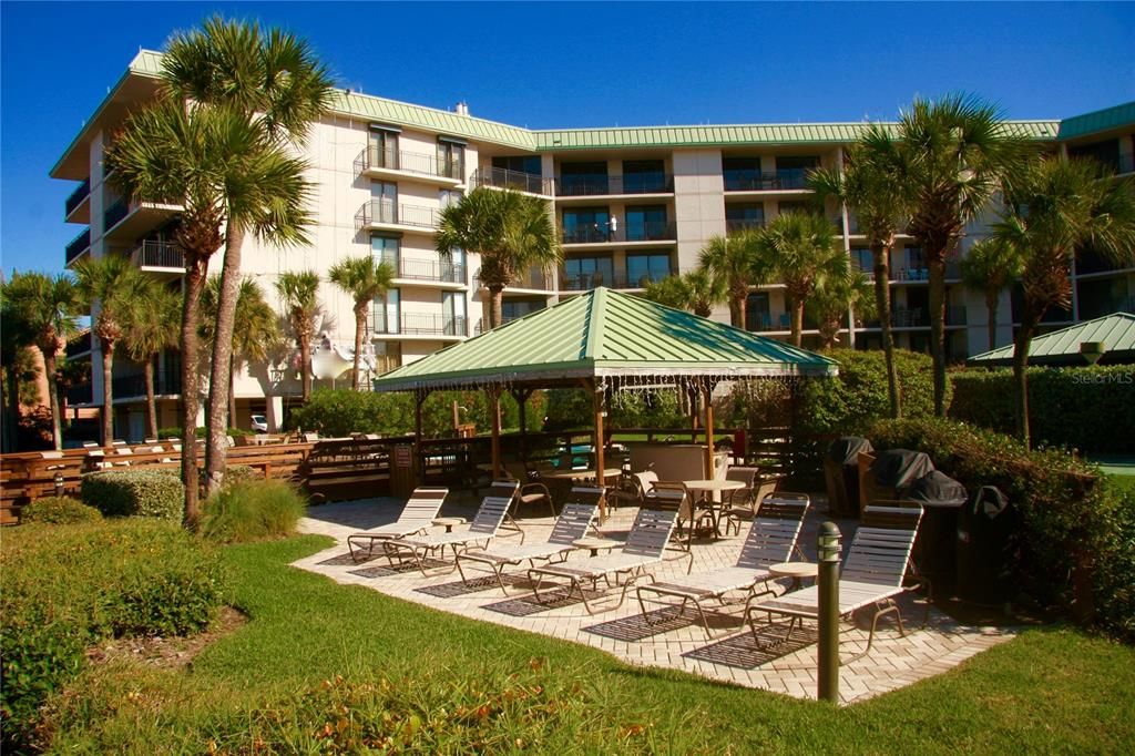 Gazebo with 3 grills and pavered lounging area sits right on the beach w lovely views