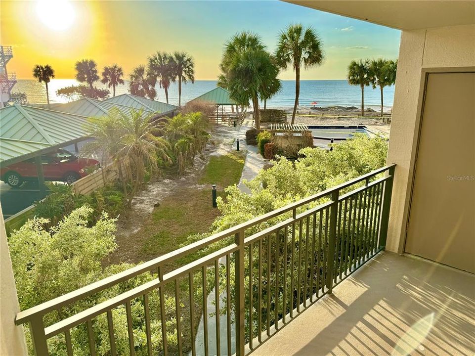 Sunset and Gulf Views from private balcony with access from Living Room and Bedroom.