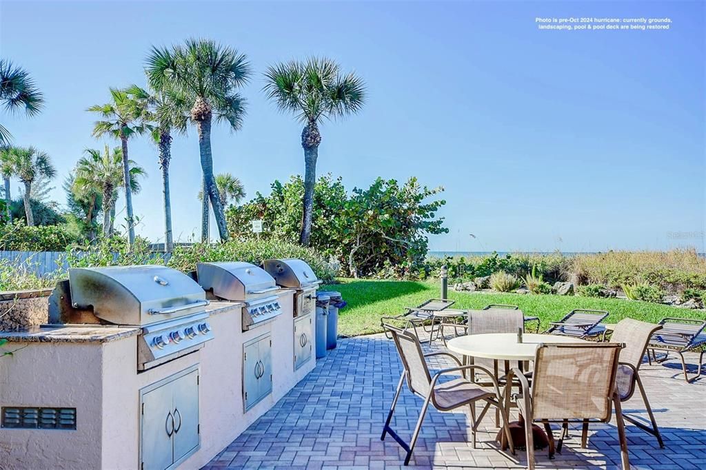 3 BBQ grills- 2 gas & 1 charcoal on the gazebo deck.