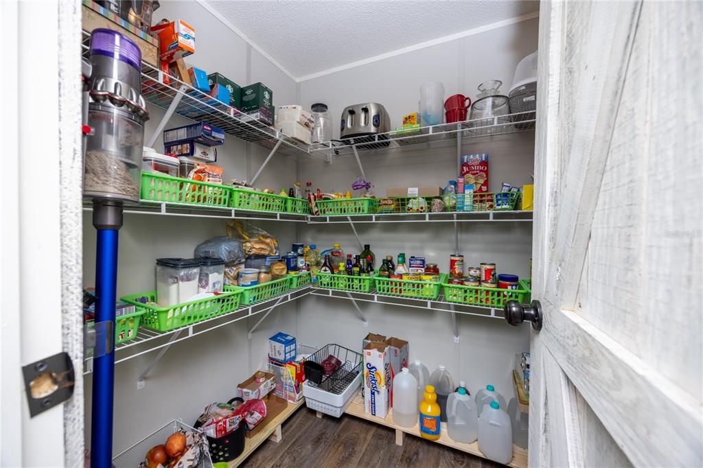 Walk in pantry. Turns right and is full width of kitchen!