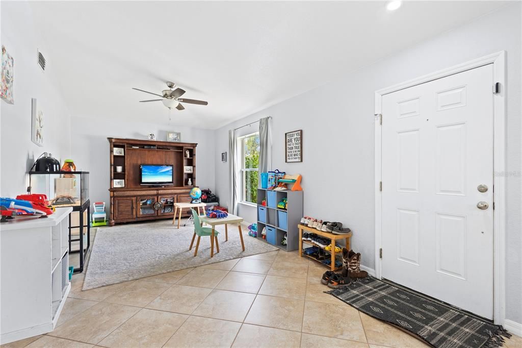 FORMAL DINING ROOM LIGHT BRIGHT TONS OF TILE THROUGHOUT!