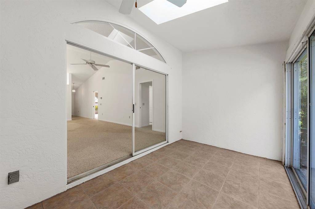 Skylights add to the ambiance of the sunroom and add extra natural light into the great room!