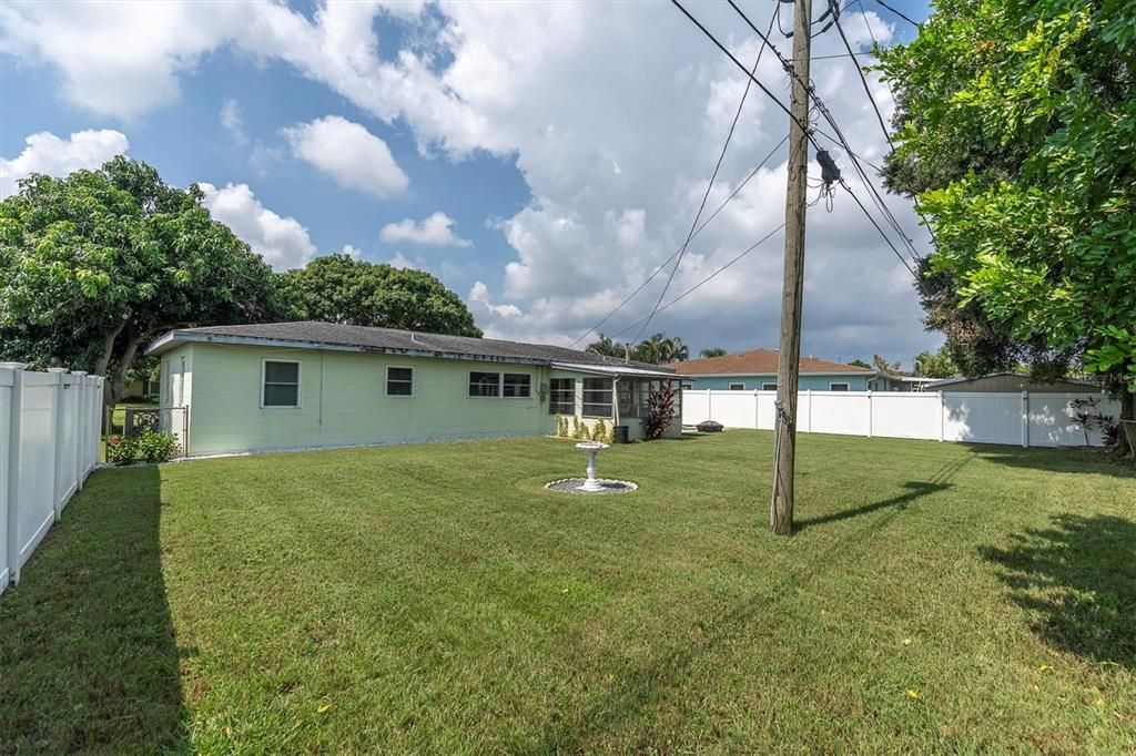 Large, fully fenced backyard