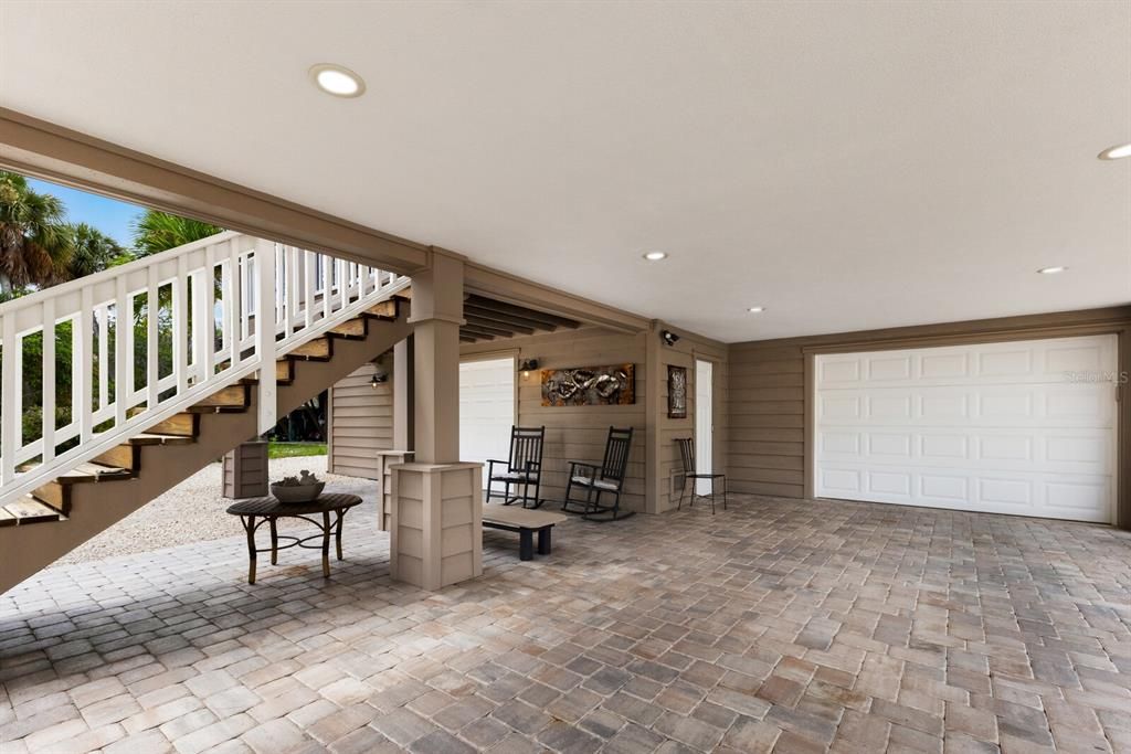 paved carport with second garage - great for parking golf cart of additional vehicles