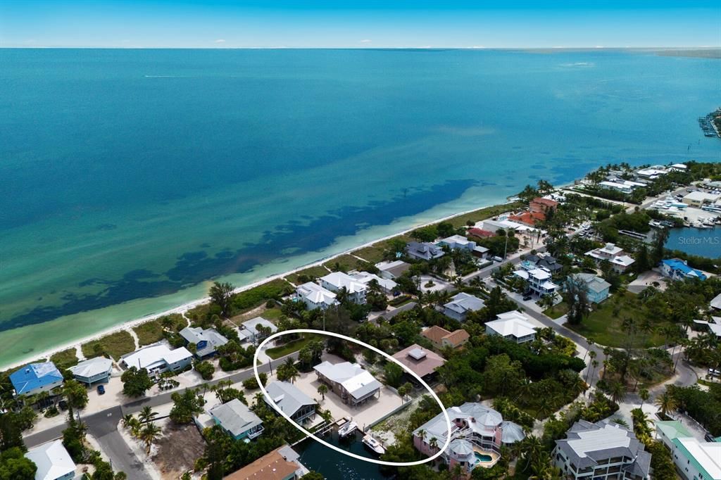 Canal front home on the N end of Anna Maria across the street from the bay