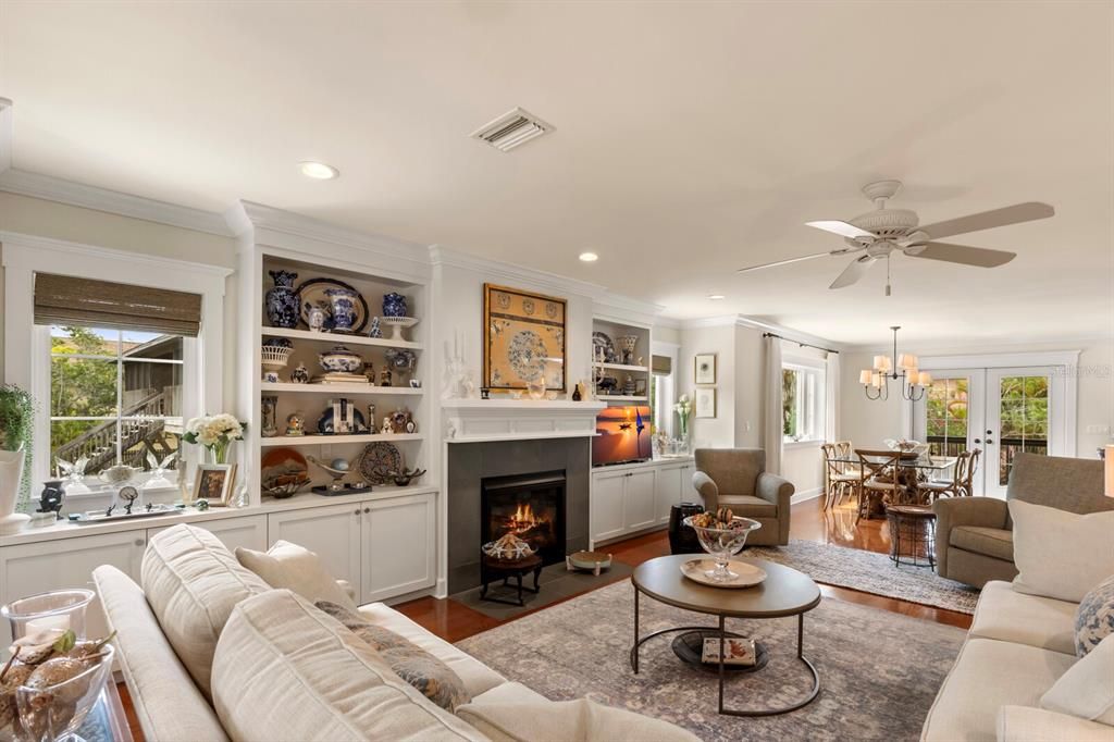 gas fireplace and custom built ins in the living room