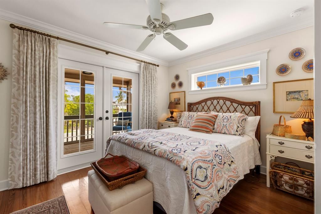 bedroom 3 w/ french doors to screened in patio