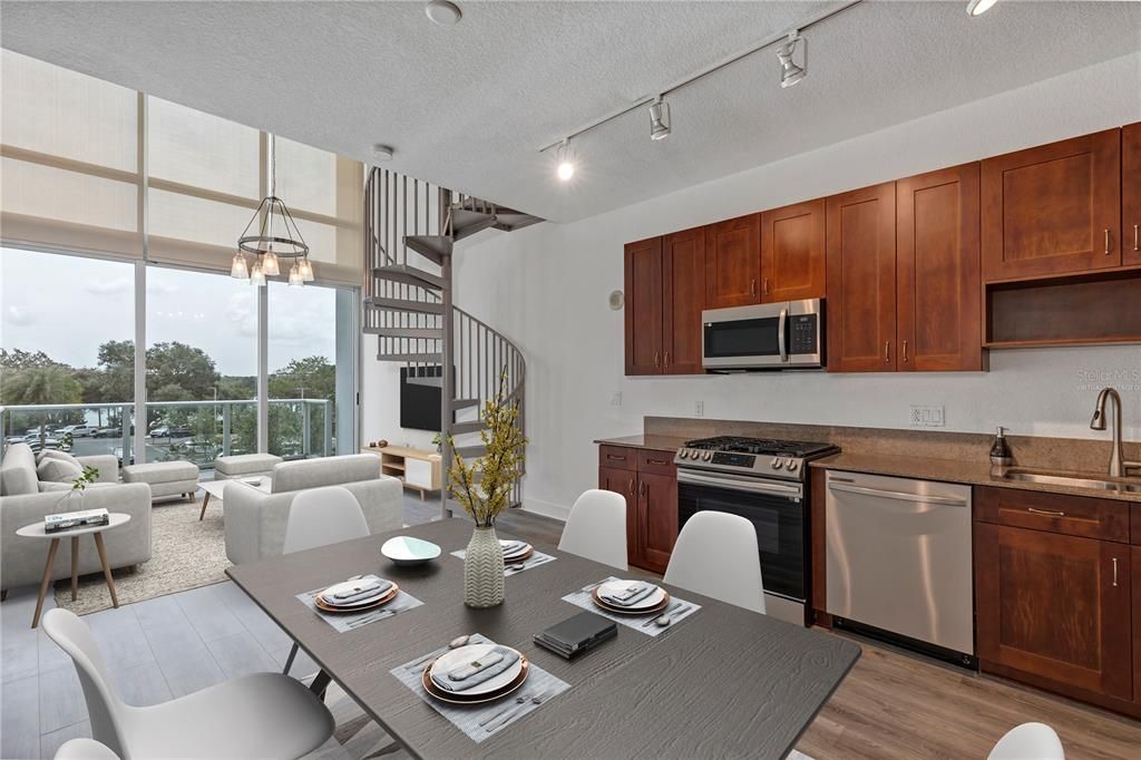 Virtually staged kitchen, family and dining area