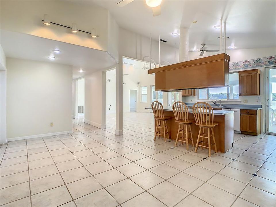 view from dining room to kitchen & great room