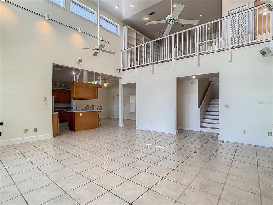 view from great room to kitchen & 2nd floor