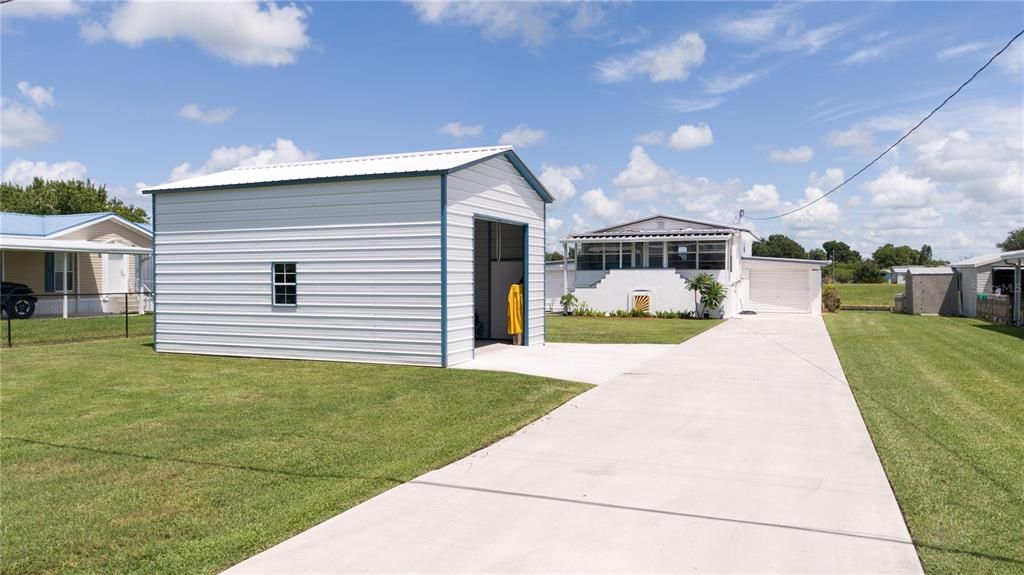 DRIVEWAY WITH METAL BUILDING